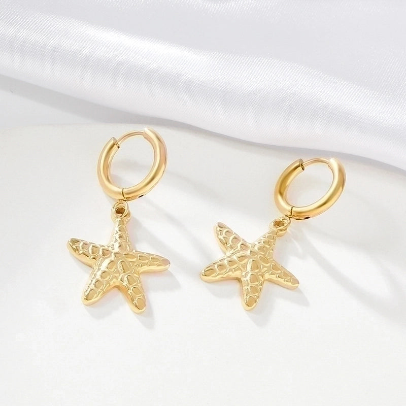 Thalassa 18k gold plated star fish hoop earrings.