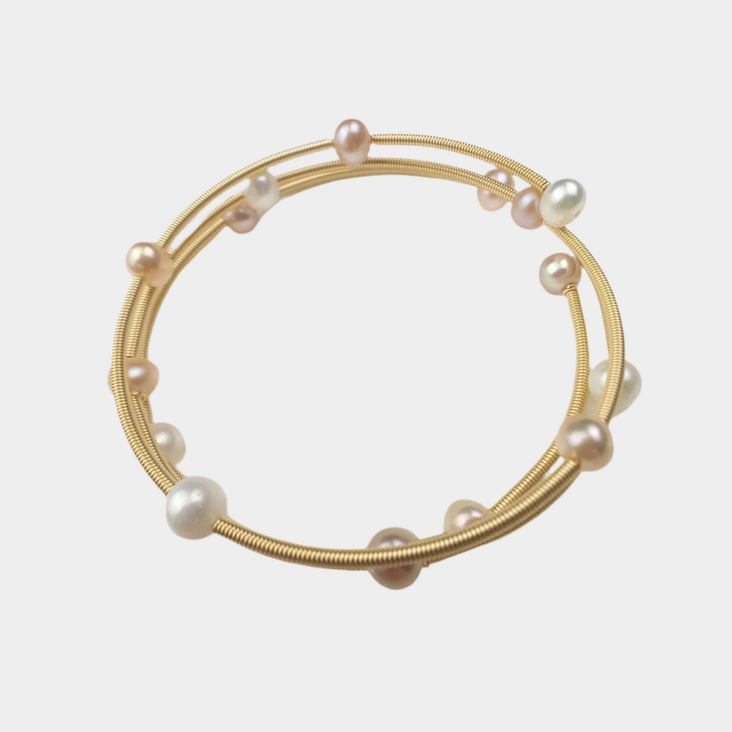 Theia fresh water pink pearl 14k gold plated bangle.