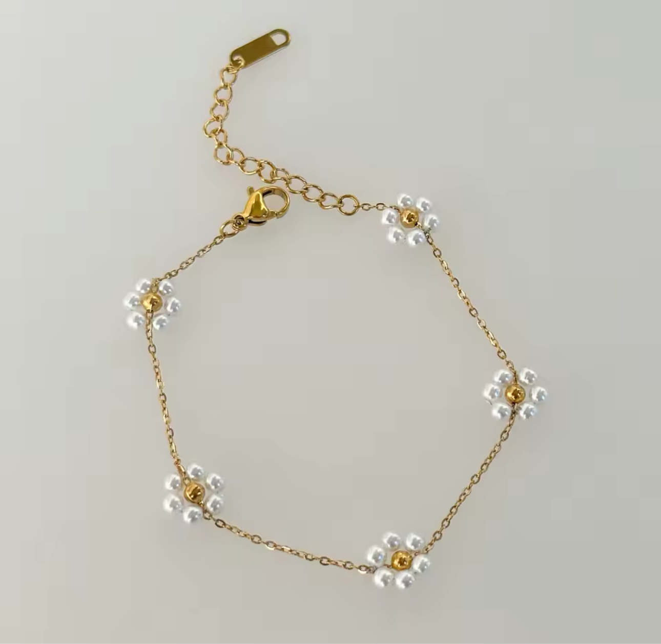 Flora gold dainty flower bracelet.