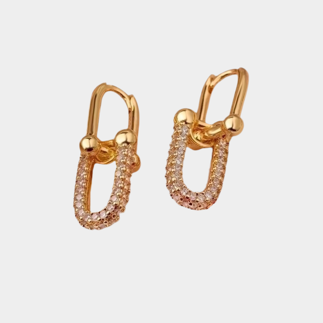 Cybele minimalist horse shoe buckle earrings, 18k gold plated.