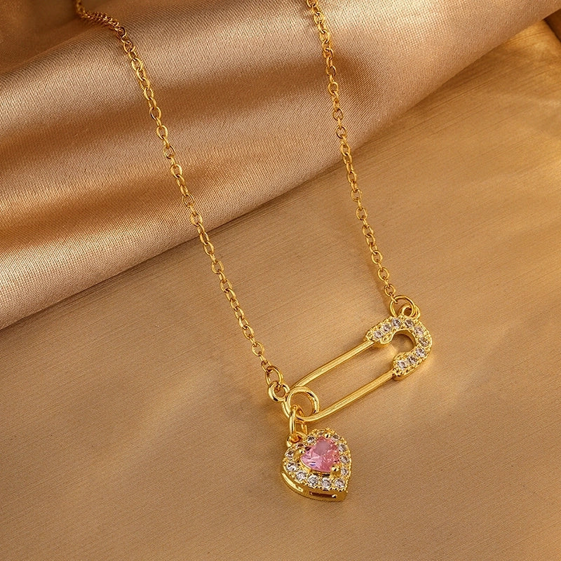 Philia pink sweetheart safety pin necklace, 18k gold plated.