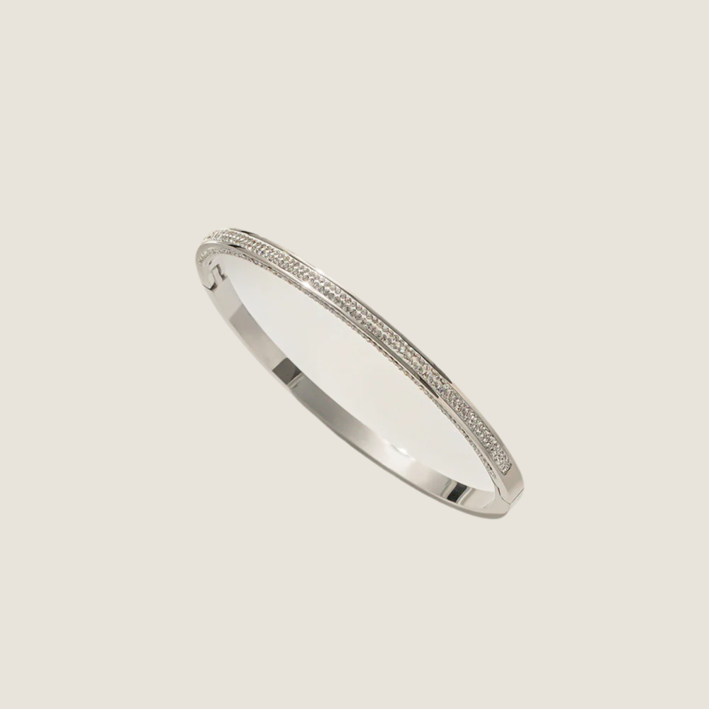 Seirios zircon silver bangle.