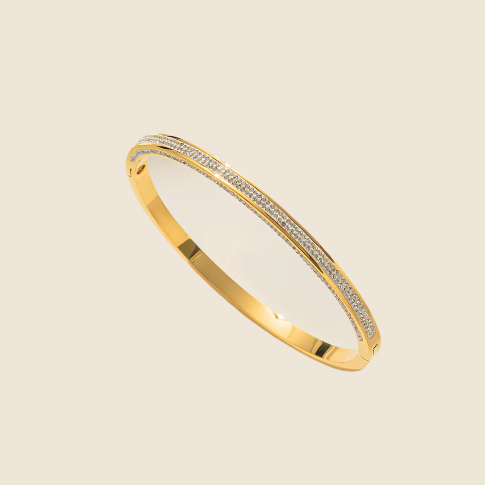 Seirios zircon 18k gold plated bangle.