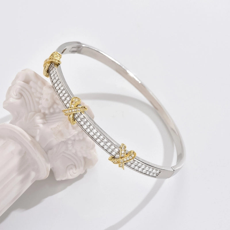 Kristallo X Zircon Silver & 18k gold plated bagel.