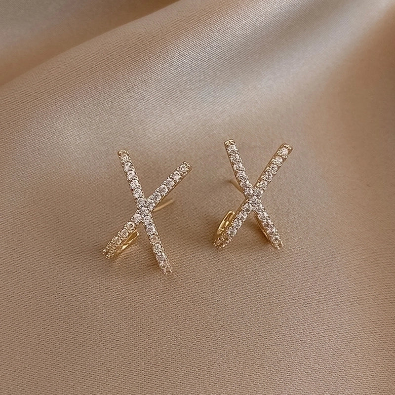 Elplis zircon X stud earrings , 18k gold plated.
