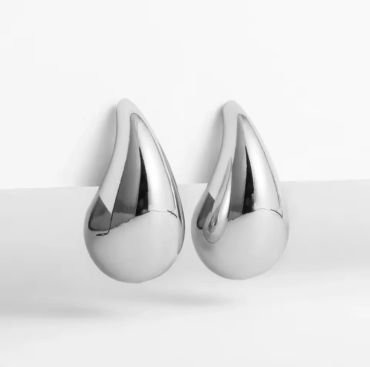 Amphitrite silver droplet earrings.