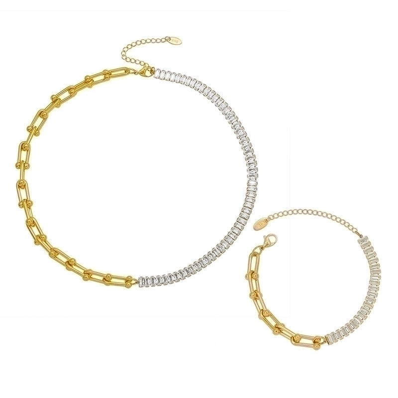 Gold 18k gold zircon horse shoe necklace & bracelet.