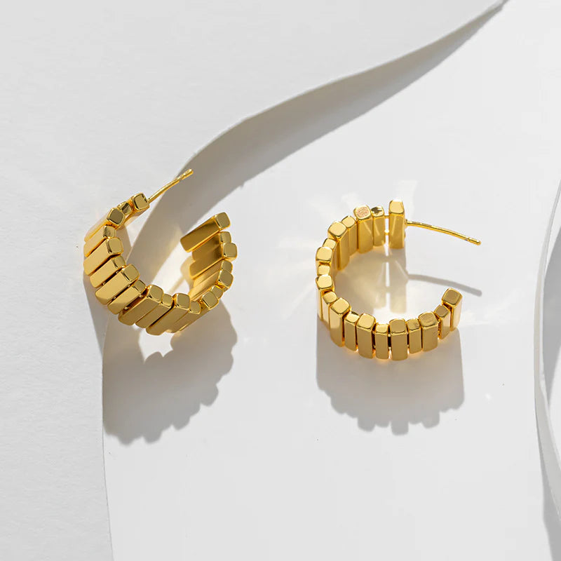 Athena asymmetrical earrings.