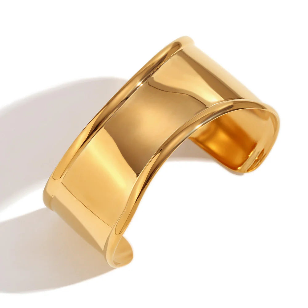 Clio 18k gold plated bangle.