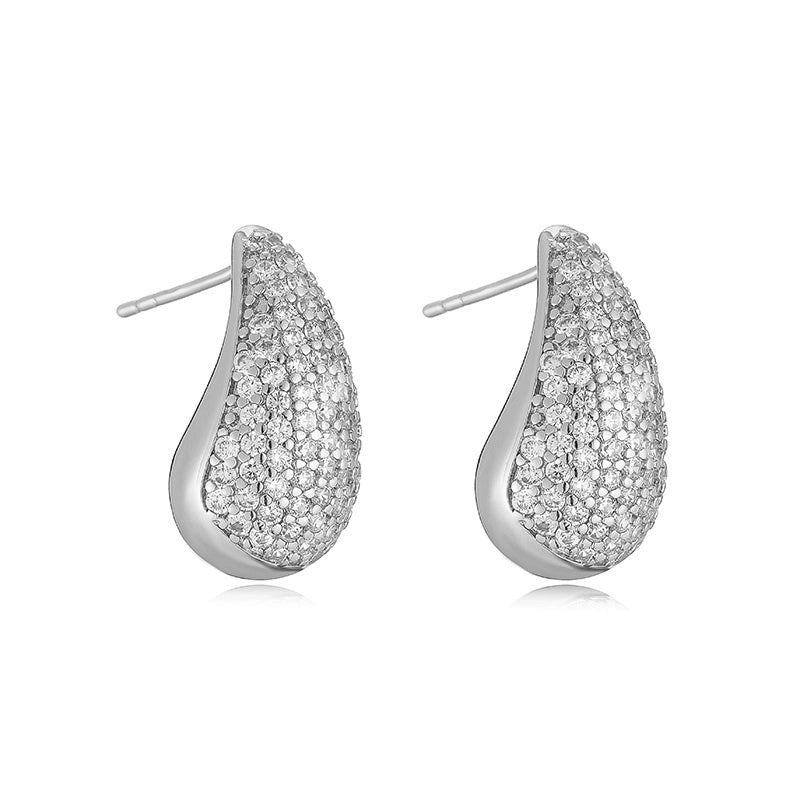 Cytherea silver droplet zircon earrings.