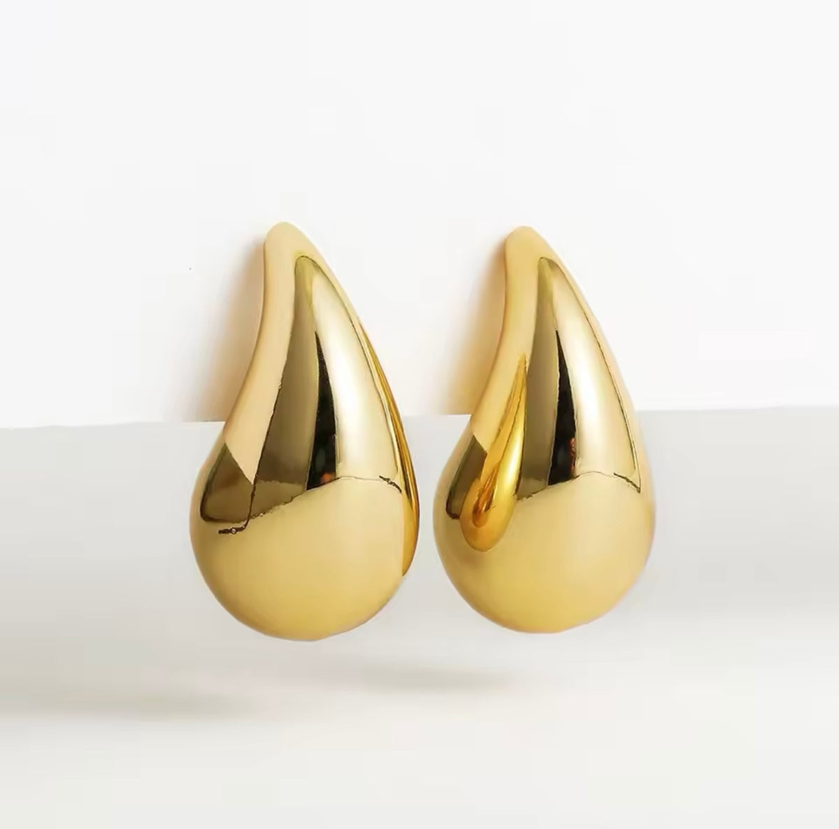 Amphitrite 18k gold plated droplet earrings.