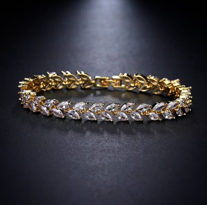 Gold leaf tennis bracelet