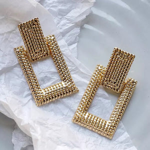 Gold studded premium shape earrings
