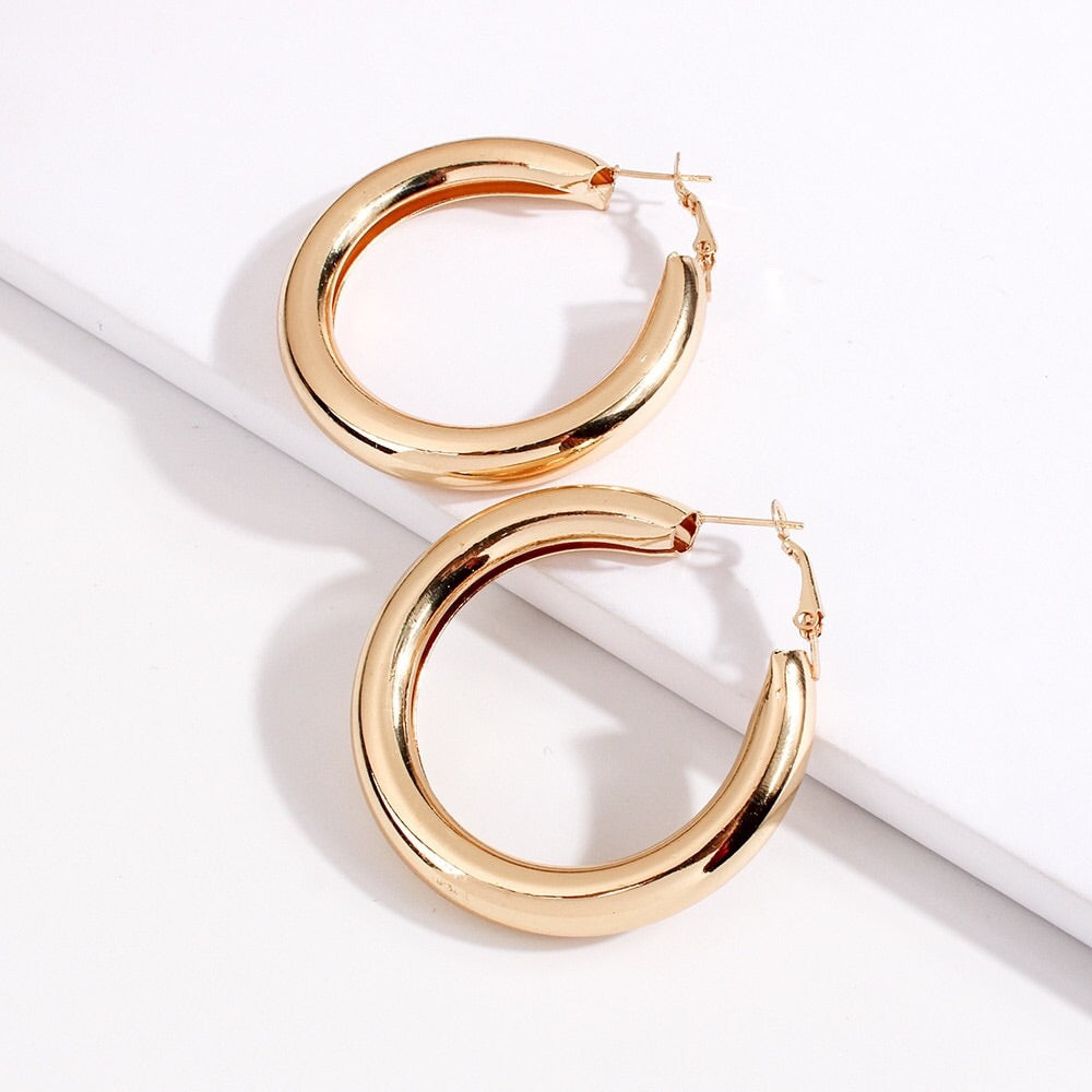 Gold thick statement hoops