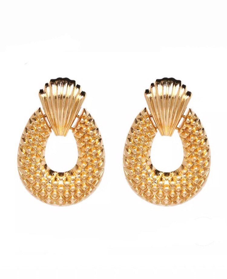 Gold statement shell earrings